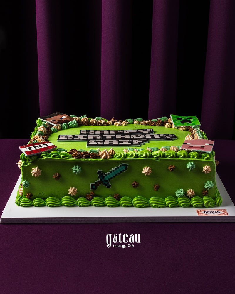 Minecraft lovers cake decorated with green frosting, character figures, and themed designs from the game