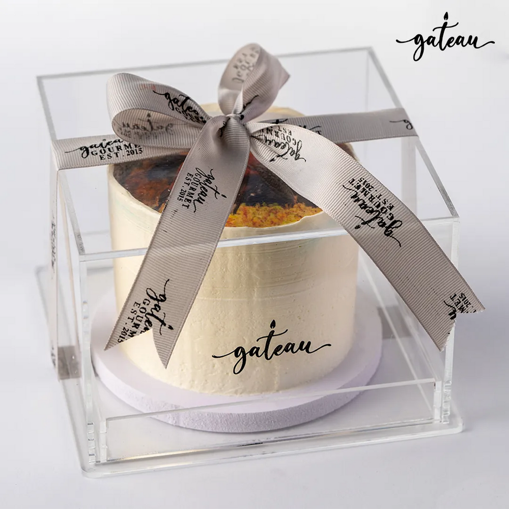 Minimalist photo cake from Gateau Gourmet Cafe in clear gift box with branded ribbon
