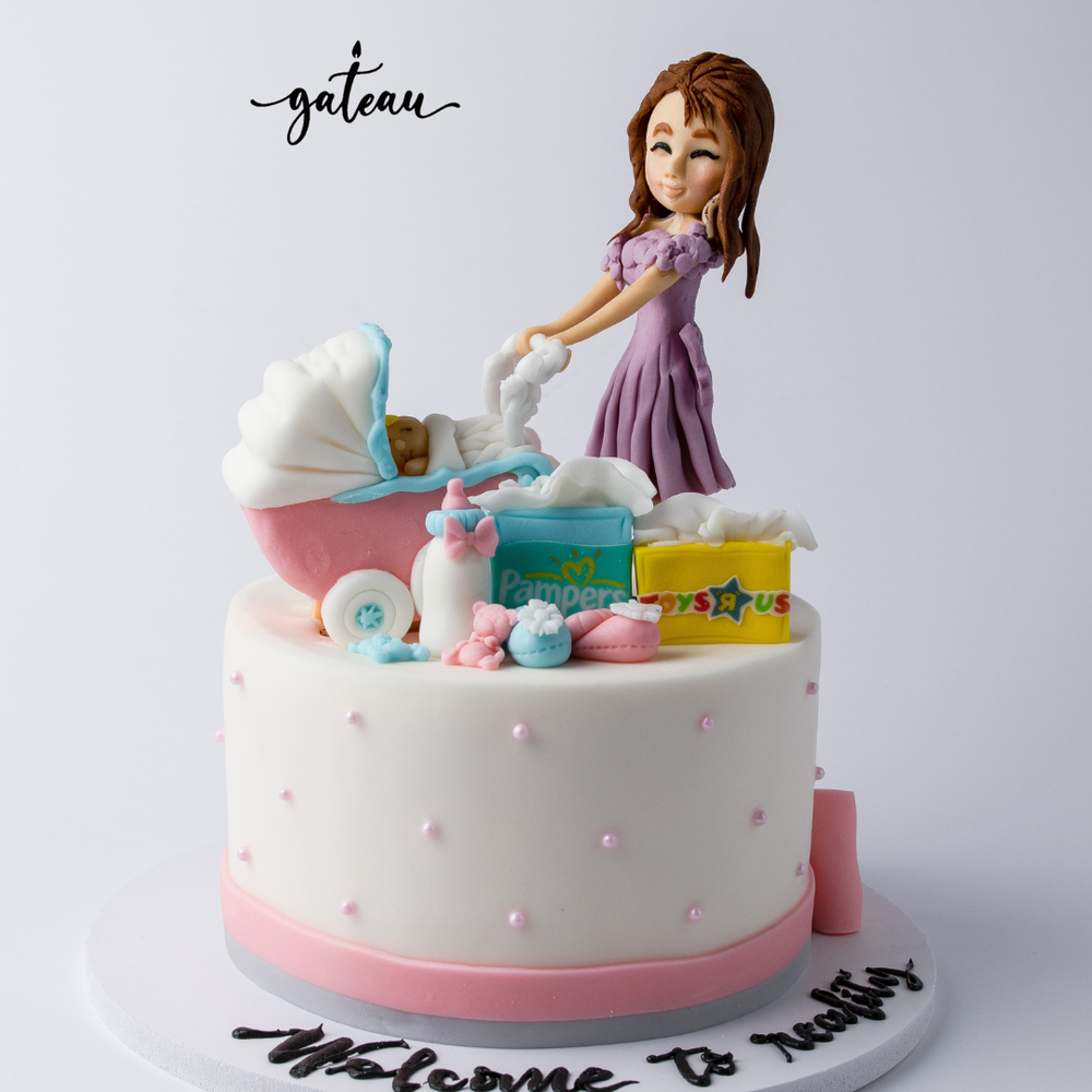 Mommy and Baby Day Out Cake featuring a figure of a mother with a stroller and playful decorations