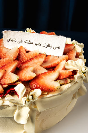 Gateau Gourmet Cafe strawberry cake decorated with fresh flowers for Mother's Day cake delivery
