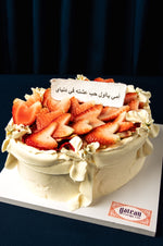 Gourmet cake topped with fresh strawberries and cream from Gateau Gourmet Cafe for Mother's Day cake delivery