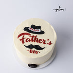 Mustache Father's Day Cake with black hat and mustache decoration from Gateau Gourmet Cafe