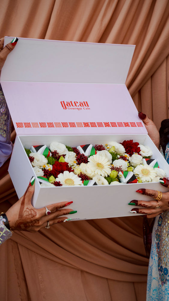 National Day flower box with chocolates featuring white and red flowers beautifully arranged