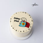 Personalized Father's Day cake with super dad superhero design and white frosting from Gateau Gourmet Cafe