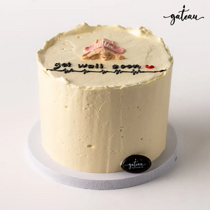 Gateau Gourmet Cafe personalized Get Well cake with creamy white frosting and decorative message