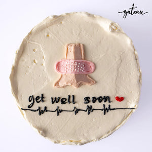 Gateau Gourmet Cafe personalized Get Well cake with bandaged finger design and get well soon message