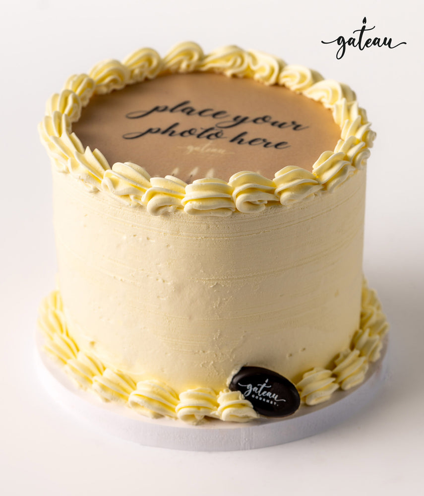 Gateau Gourmet Cafe vanilla cake with smooth buttercream and space for photo cake with edible image on top