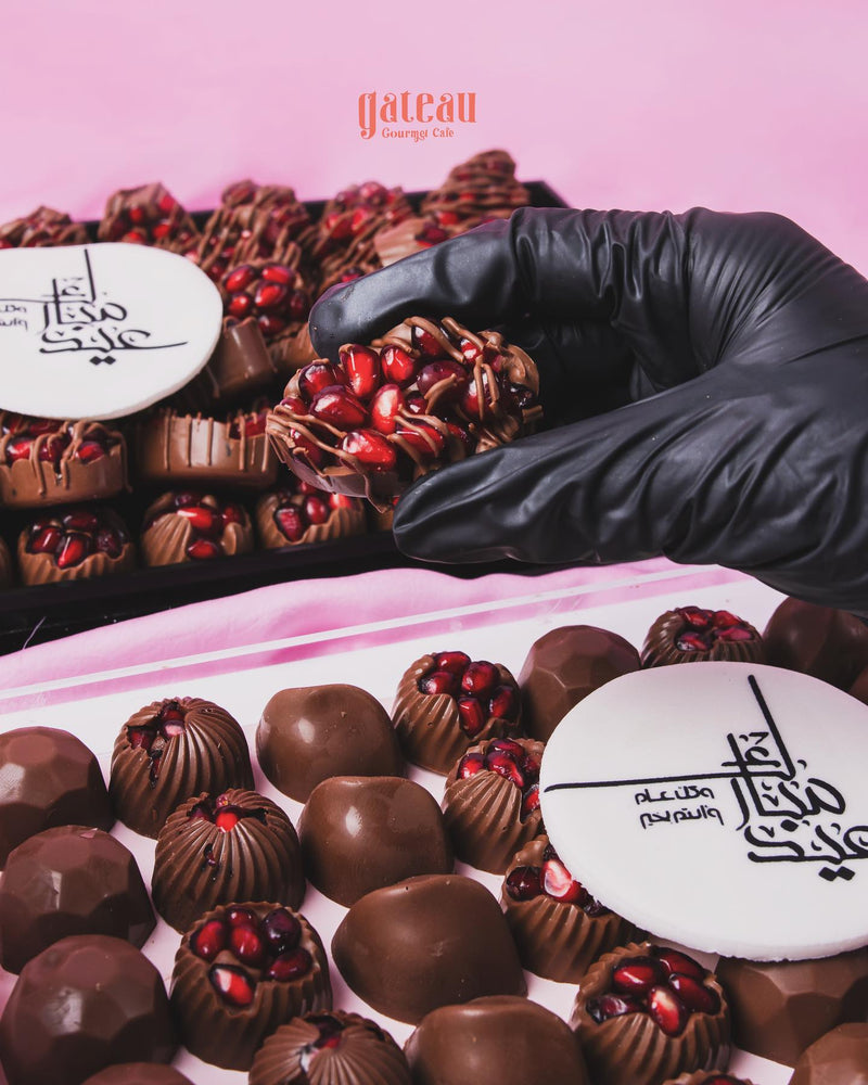 Delicious pomegranate chocolate set featuring a variety of chocolates with pomegranate seeds