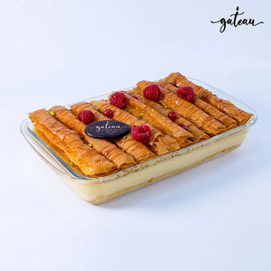 Raspberry Crème Brûlée dessert tray from Gateau Gourmet Cafe topped with raspberries and layered with crispy pastry