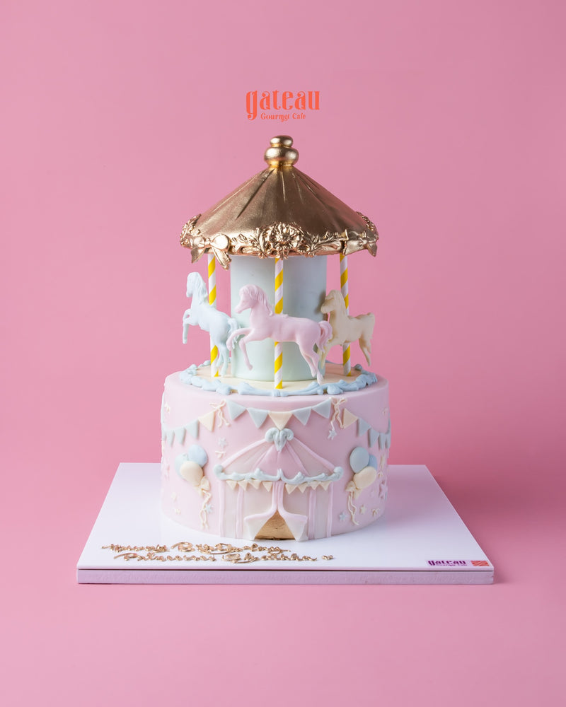 Elegant carousel cake with a shoes-cream-cake-design featuring unicorns and gold accents