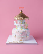 Elegant carousel cake with a shoes-cream-cake-design featuring unicorns and gold accents