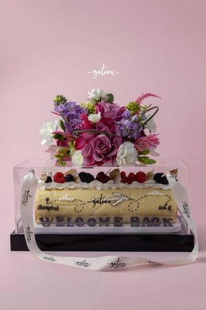 Gateau Gourmet Cafe special occasion Swiss roll decorated with fresh berries and flowers in clear box