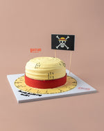 Straw Hat of One Price Monkey D Luffy Cake by Gateau Gourmet Cafe shaped like iconic yellow straw hat with red band and pirate flag decoration