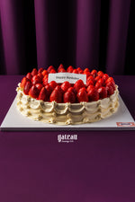Strawberry sponge cake for celebration with fresh strawberries and birthday decoration from Gateau Gourmet Cafe