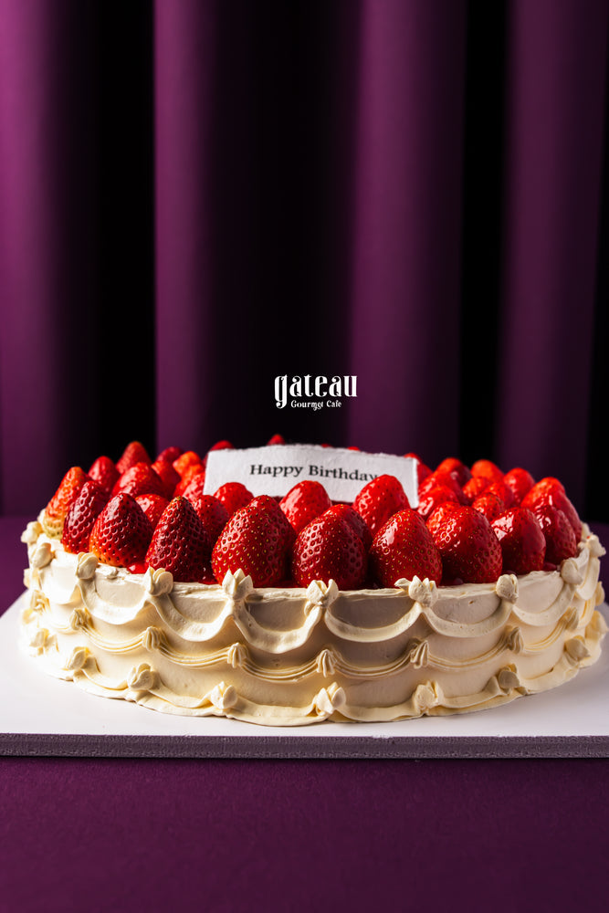 Strawberry sponge cake for celebration with fresh strawberries and cream from Gateau Gourmet Cafe