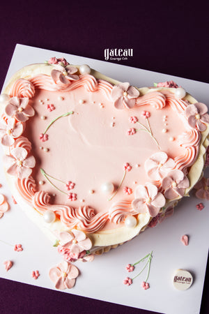 Heart-shaped pink floral cake from Gateau Gourmet Cafe, perfect unique birthday cakes for delivery