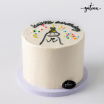 Unique Flork design cake by Gateau Gourmet Cafe with white frosting and colorful sprinkles