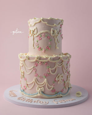 Vintage Buttercream Drape Cake with pastel colors, floral decorations, and elegant bows for celebrations