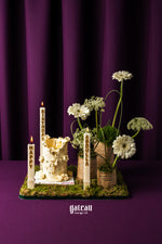 Gateau Gourmet Cafe cake with white garden candlelight arrangement featuring flowers and personalized candles
