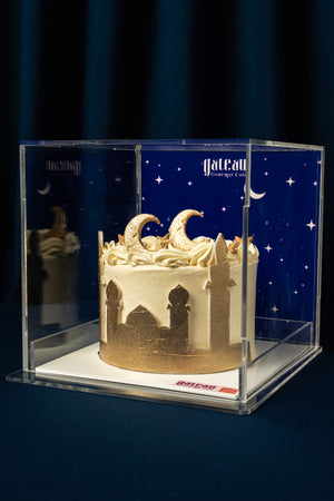 Gilded Twilight Mini Cake by Gateau Gourmet Cafe with elegant golden decoration and starry background