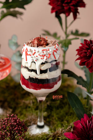 Delicious goblet cake arrangement featuring layers of cake, creamy filling, and festive toppings