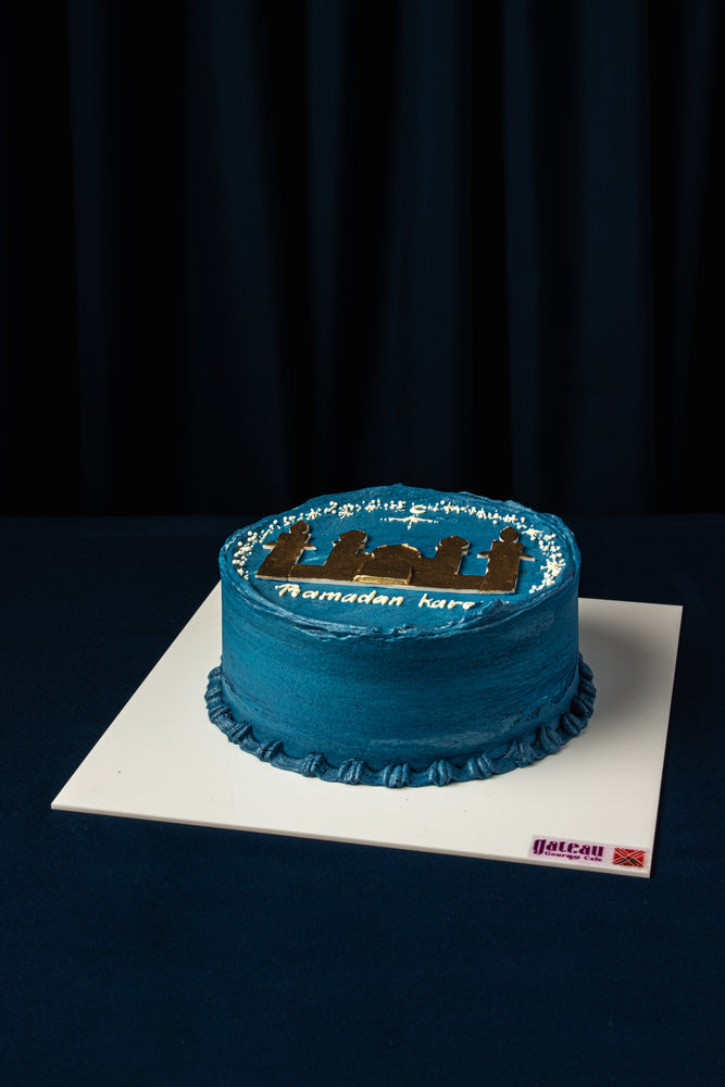 Gateau Gourmet Cafe Golden Minaret Mini Cake with blue frosting and mosque design on top