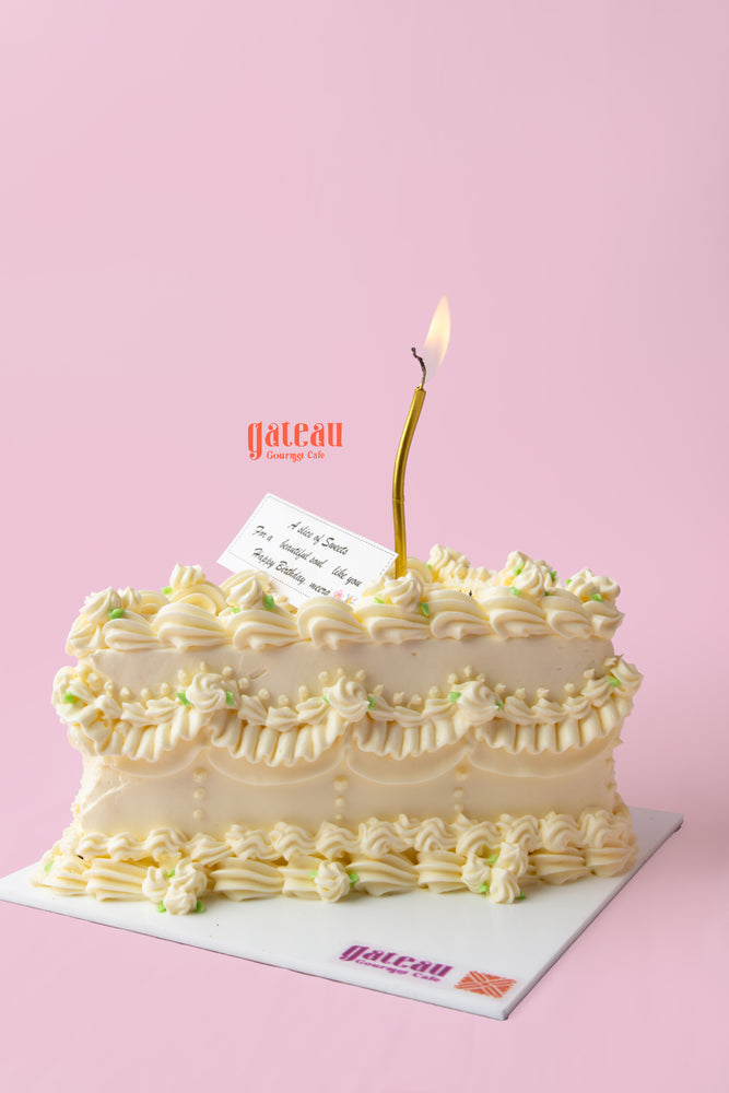 Delicious gourmet birthday cake with elegant frosting from Gateau Gourmet Cafe for celebrations, perfect for gourmet birthday cakes near me.