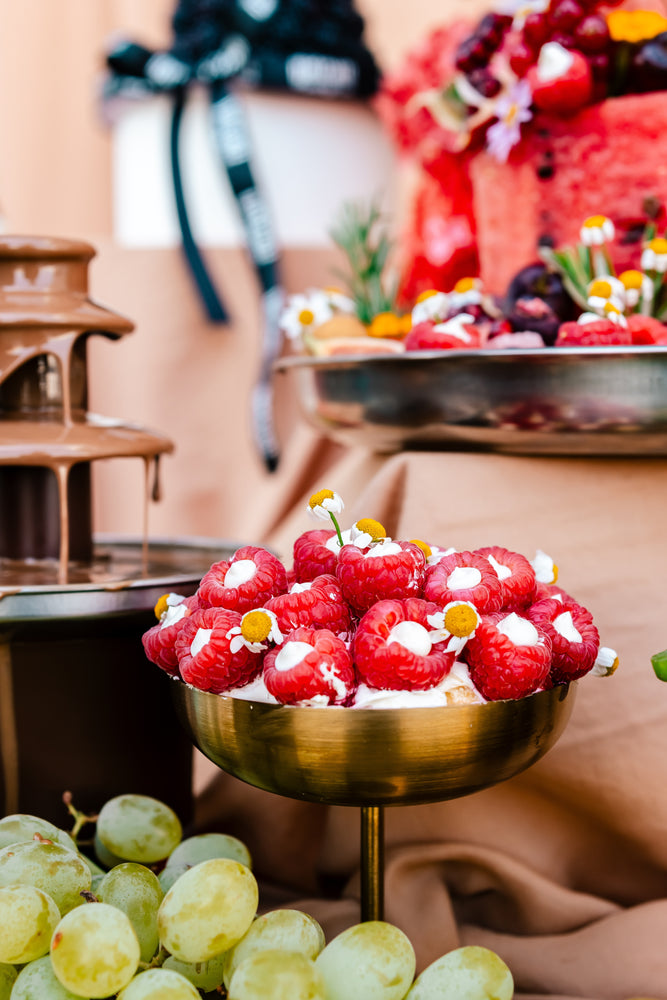 Delicious guilt free fruit dessert with fresh raspberries displayed at Gateau Gourmet Cafe