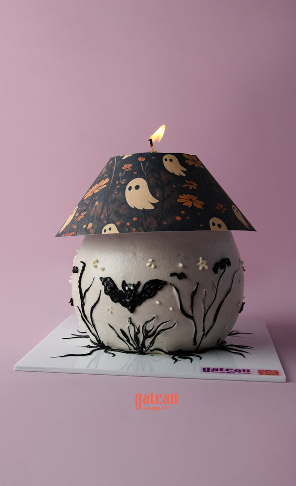 Halloween lamp cake designed with spooky motifs and a bat theme, perfect for festive celebrations