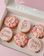 Gateau Gourmet Cafe handcrafted cupcakes online pink birthday cupcakes with decorative frosting and gold lettering