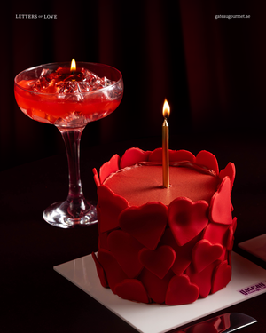 Heart Bundle Mini Cake With Candle decorated with red fondant hearts, perfect for celebrations