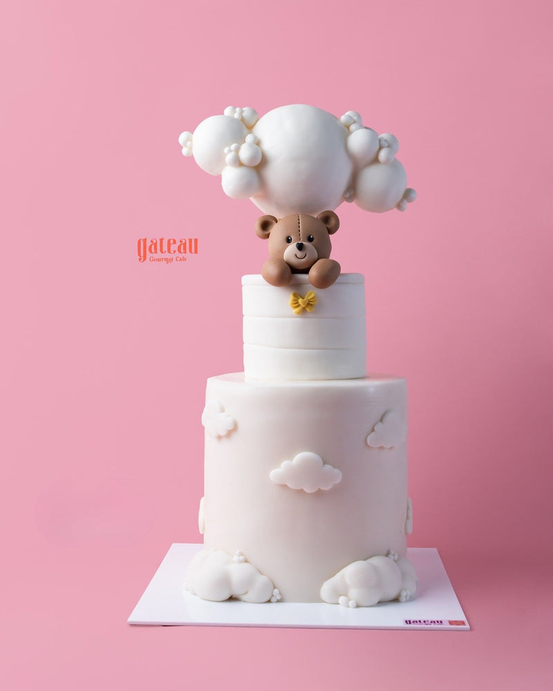 Hello teddy bear cake from Gateau Gourmet Cafe with a cute bear and fluffy clouds decoration