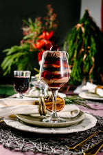 Gateau Gourmet Cafe holiday desserts for parties parfait with layers of chocolate and cherries on festive table