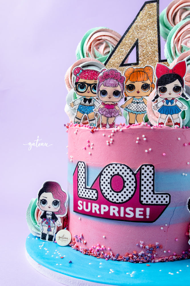 Colorful LOL themed birthday cake with playful designs and festive decorations for a fun celebration
