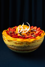 Mango fruit bowl dessert with layers of mango and strawberries at Gateau Gourmet Cafe