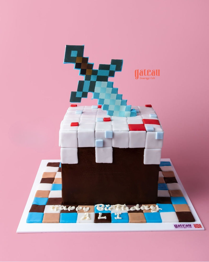 Minecraft Sword Theme Fondant Cake by Gateau Gourmet Cafe with pixelated design and detailed sword decoration