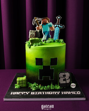 Minecraft themed cake from Gateau Gourmet Cafe with colorful decorations and fondant characters