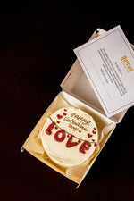 Mini Love Lunch Box Cake from Gateau Gourmet Cafe with festive decorations for Valentine's Day