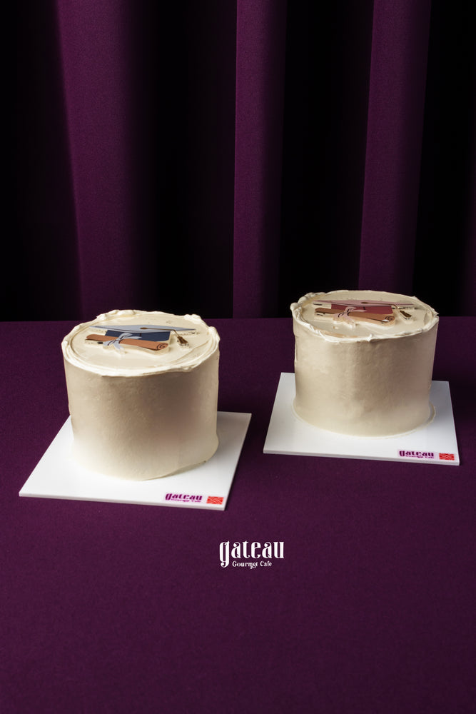 Minimalist Graduate Cake from Gateau Gourmet Cafe, elegantly decorated with simple frosting and grad cap design