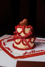 Nano Classic Red Ribbon Cake from Gateau Gourmet Cafe, decorated with red ribbon and heart accents