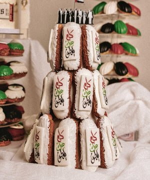 Gateau Gourmet Cafe stacked donuts decorated for National Day cake delivery celebration