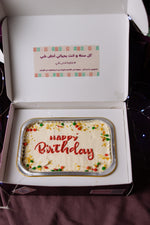 New Year-Birthday Loaf Cake from Gateau Gourmet Cafe with Happy Birthday icing and colorful sprinkles