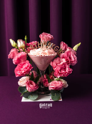 Gateau Gourmet Cafe pink princess birthday cake decorated with pink flowers and creamy frosting