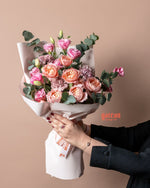 Beautiful pink rose bouquet with eucalyptus, perfect for special occasions from Gateau Gourmet Cafe