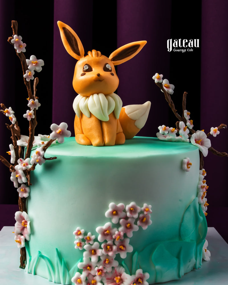 Pokemon Eevee on Its Nature Fondant Cake with Floral Decorations for Celebrations
