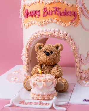 Princess crown cake for girls with teddy bear decoration and pink birthday design by Gateau Gourmet Cafe