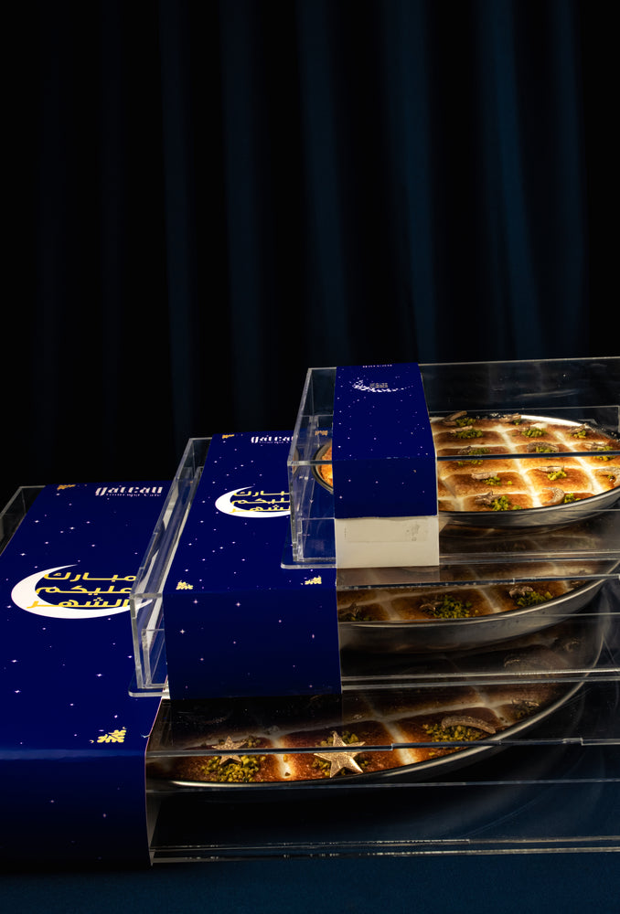 Gateau Gourmet Cafe Ramadan basboosa dessert beautifully packaged in elegant boxes with decorative designs