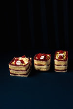 Three delicious Raspberry Fruit Treats layered with cream and cake from Gateau Gourmet Cafe