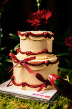 Red Ribbon Classic Mini Cake with Elegant Ribbon and Floral Decoration for Special Occasions