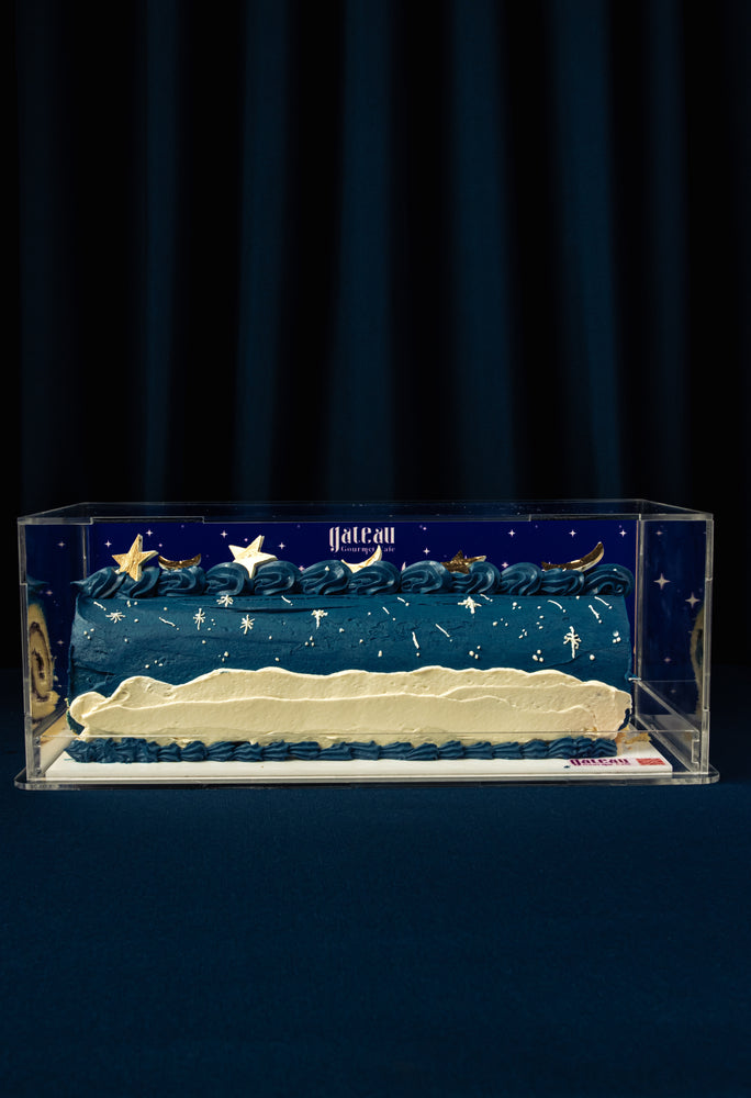 Sky Canvas Ramadan Roll Cake from Gateau Gourmet Cafe with decorative blue and white icing